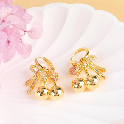 Dangle Gold Bow Cherry Charm Earrings for Women Sweet 14K Gold Plated Pink Crystal Cubic Zirconia Bowknot Cherry Huggie Hoop Earrings Drop Bow Knot Fruit Earrings Trendy Party Jewelry Gifts for Women